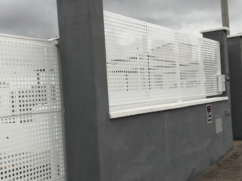 fenced with squared slats